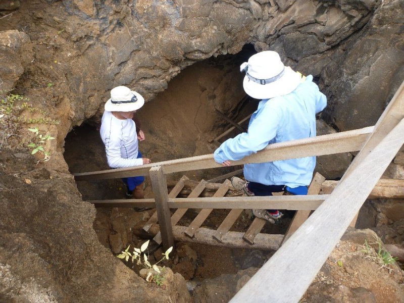 Going down into one of the lava tubes or tunnels on Floreana Island