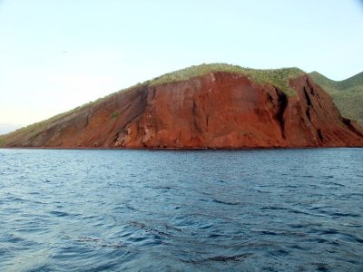 Rbida Island - The red color is from iron deposits in the volcanic ash