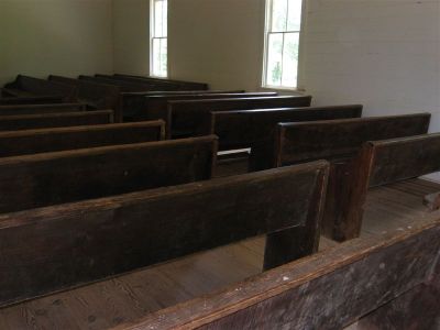 Generally a two front door design allowed men to enter and sit on one side of the chapel and women and children on the other. Some churches even had a divider in the middle of the chapel. However, the Cades Cove's Methodist congregation was more relaxed and sat where they pleased.