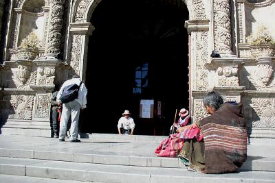 Beggars on church steps