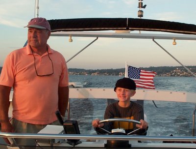 Dad and Harrison on Sea Trials for Harrison's new Yacht!