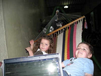 Surfing the Net with Daves kids at the Quinteros Managuan compound.