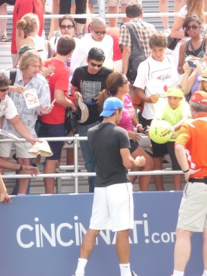 Roger signing autographs