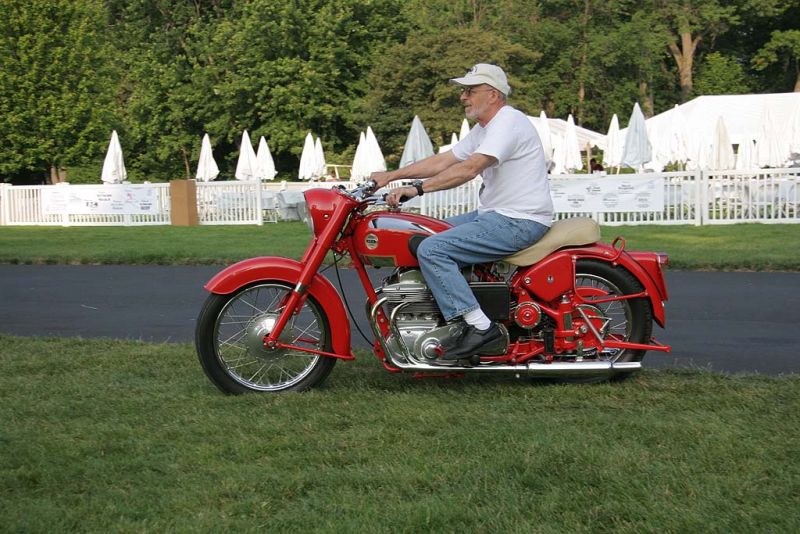 Maneuvering the 1959 Ariel Square 4 Mk II into place