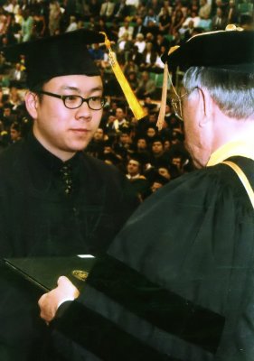 Receives his bachelor's degree