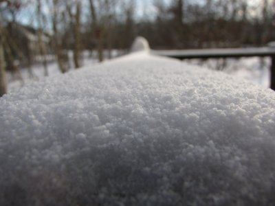 Snow on our Deck Rail.jpg