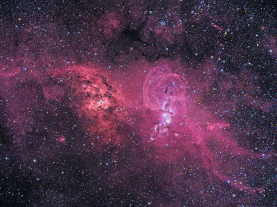 Two Red Nebulae in Carina