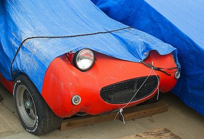 One-Eyed Austin Healy Sprite being restored.