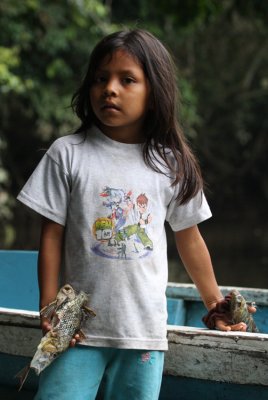 Little Huaroni girl fishing for lunch
