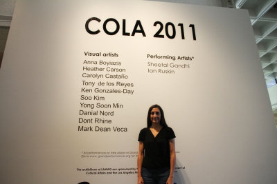 the COLA exhibition poster