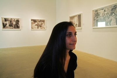 Anna Boyiazis with her photographs