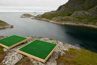 Would you believe a driving range - target is round fish farm in sea. Golf balls are compressed fish-food