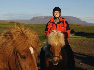 Icelandic horses, American rider with penguin zipper-pull talisman.
