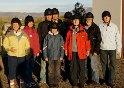 Riders squint into evening sun after an hour on Icelandic horses at Lake Myvatn.