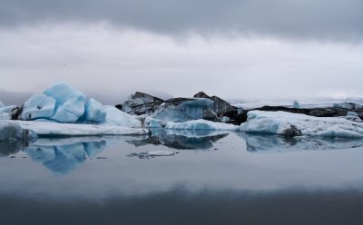 In Jokulsarlon lagoon, icebergs calved from the southern edge of Vatnajokull icecap.