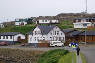New homes, hotel and cell tower in Djupivogur.