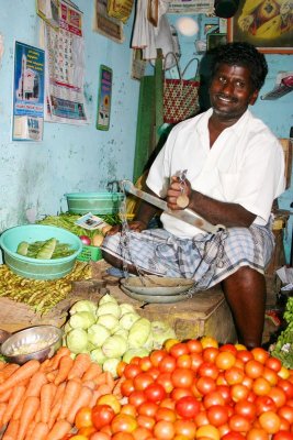 Vegetable vendor with his scale, Madurai
