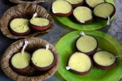 Ghee lamps, Pazhamudhircholai Temple, Madurai, India