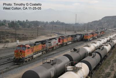 BNSF 4587 with Grain Hoppers at West Colton, CA 11-25-05
