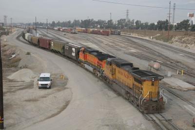 BNSF 4587 with Grain Hoppers at West Colton, CA 11-25-05