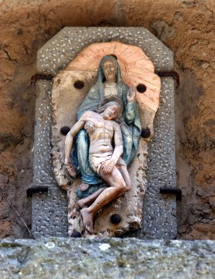 Above a door in Civita