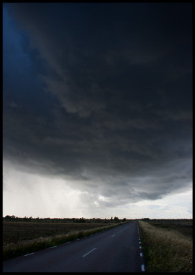 Driving under a thunder cloud near Södra Möckleby - Öland