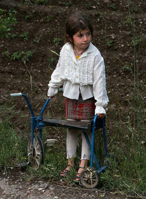 Girl with bicykle in Yeghegnadzor
