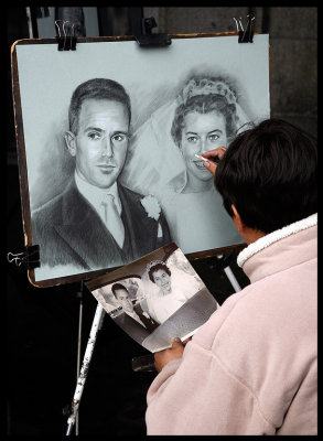 Drawing artist copying old wedding photography