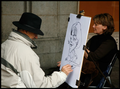 Drawing artist making a caricature