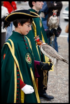 Young falconer in Easter procession