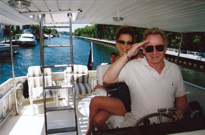 Murray Fisher with Brianna on his boat