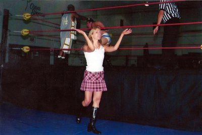 Amy Vitale in wrestling action
