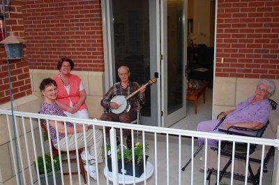 Amy enjoying Banjo Time on the Patio