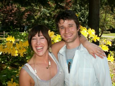 Leigh & Nick with flowers.