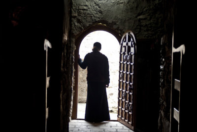 Monk in doorway