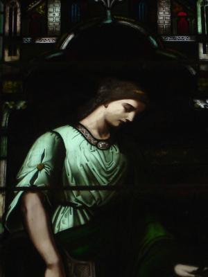Mournful Catholic stained glass