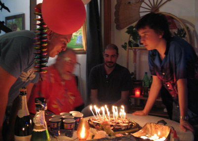 Tola and Alex blow out their candles