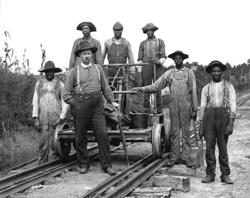 Railroad Workers With Handcar