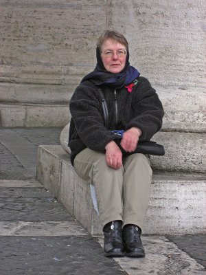 Margaret sitting and shivering beneath the columns in the piazza San Pietro .. 3184