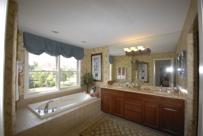 Owner's Suite Vanity and Whirplool Bath
