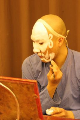 White Faced Actor Putting on Make Up