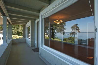 Porch off the living room. View is reflected in the window.