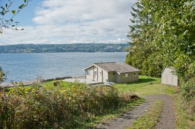 Westside waterfront cabin with acreage
