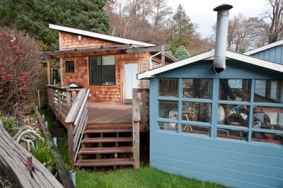 Artist studio on the left and greenhouse on the right