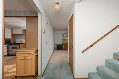 Kitchen left, office ahead and stairs up on the right