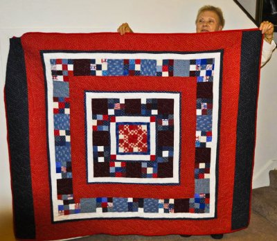 Linda Strid with her Quilt of Valor