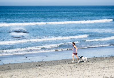 Woman and Dog at Beach