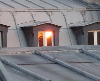 April sunrise reflect on Paris roofs