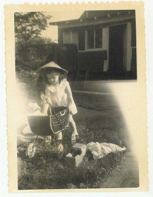 Linda Rich (age 2) in front of Spanish Camp Bungalow