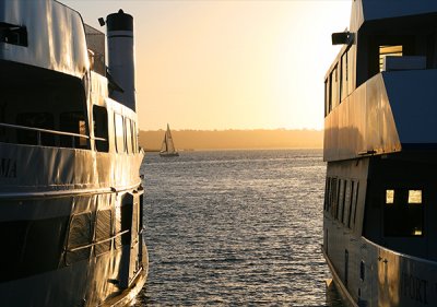 Sunset between 2 boats